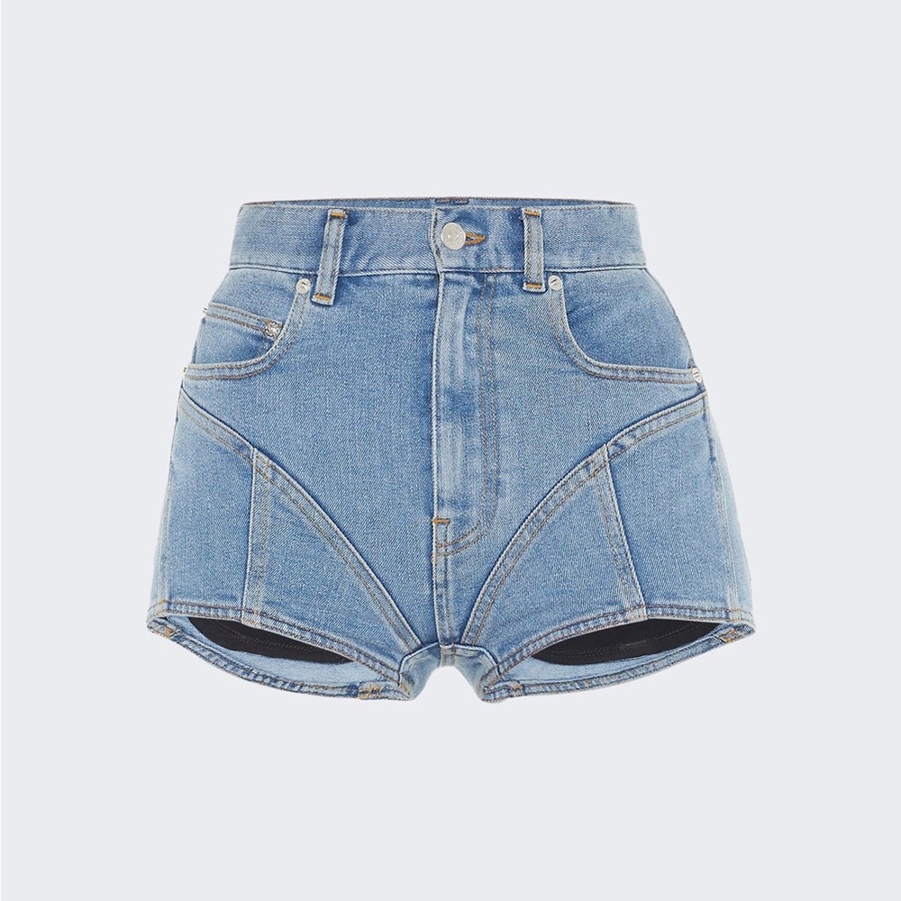 MUGLER spiral paneled denim shorts.